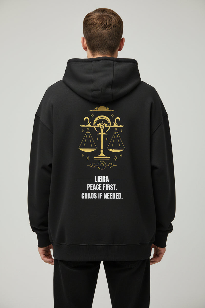 Black hoodie with Libra zodiac design and text on a white background