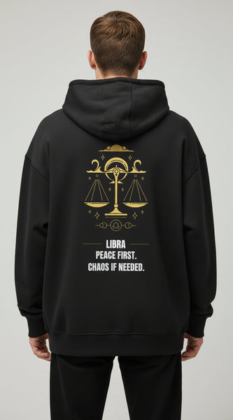 Black hoodie with Libra zodiac design and text on a white background