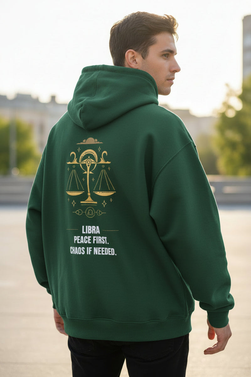Bottle Green hoodie with Libra zodiac design and text on a white background