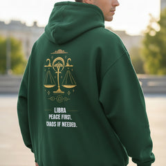 Bottle Green hoodie with Libra zodiac design and text on a white background