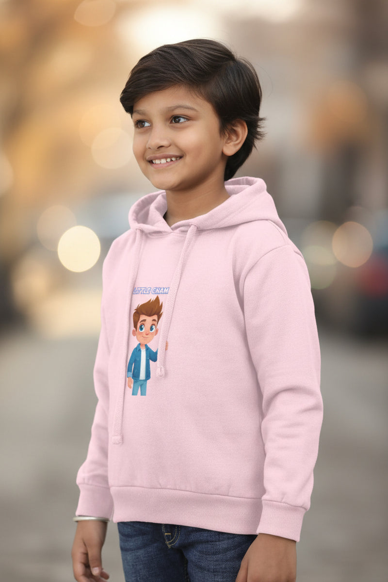 Child wearing a pink hoodie with a cartoon character on a white background