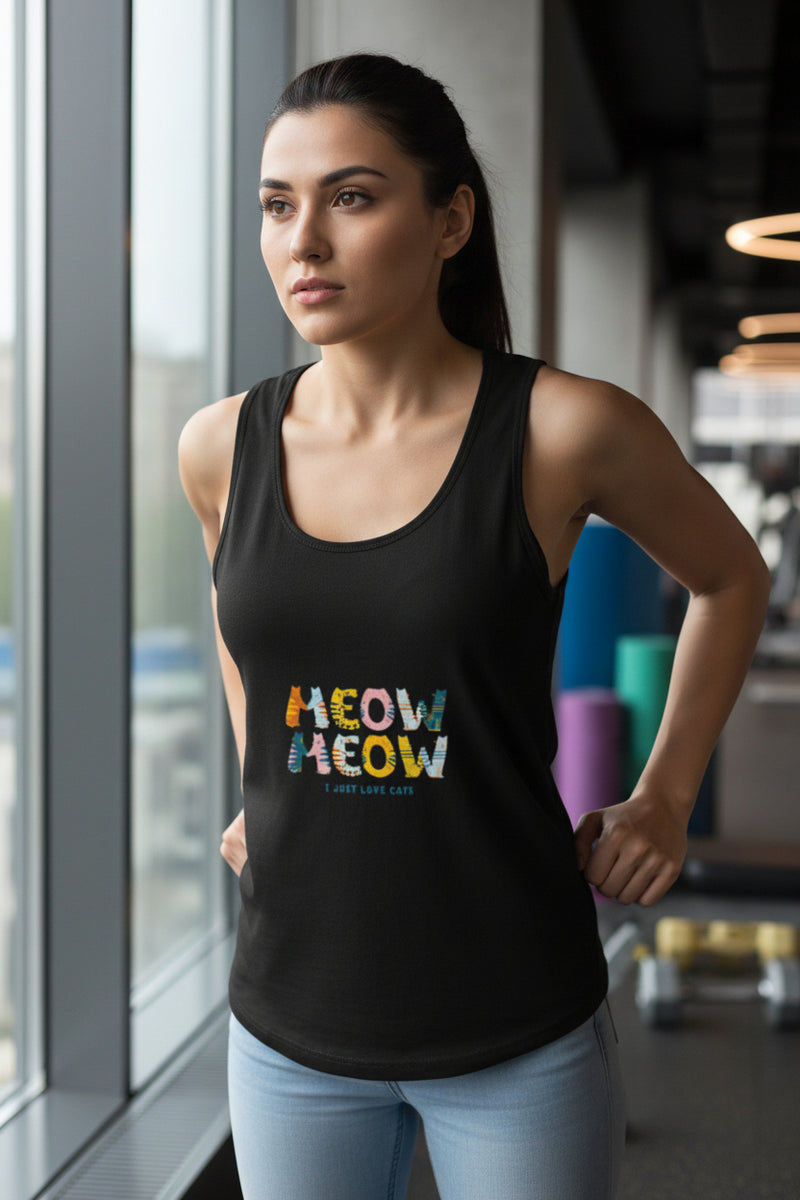 Woman wearing a black sleeveless shirt with colorful text design on a white background