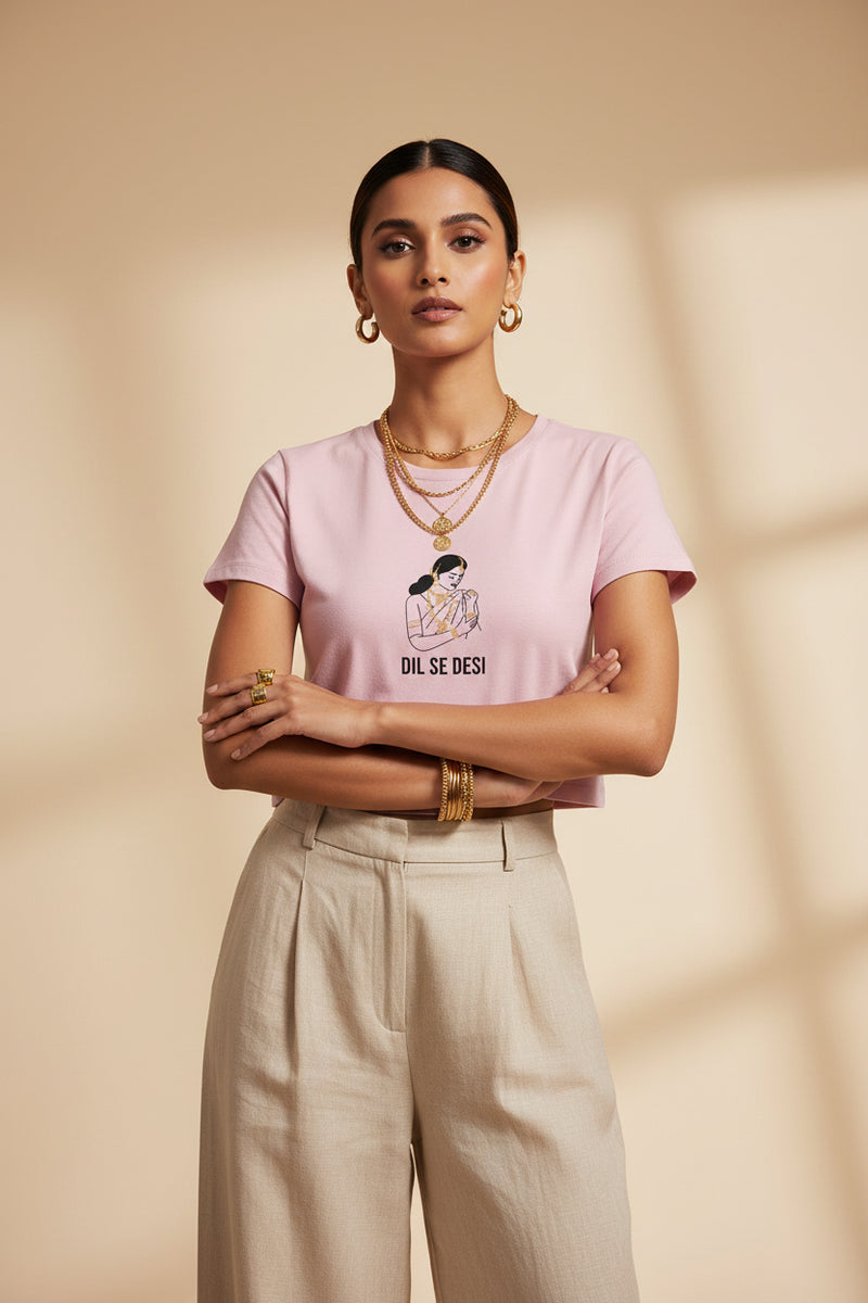 Pink t-shirt with graphic and text on a white background