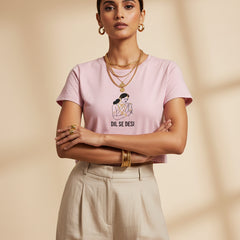 Pink t-shirt with graphic and text on a white background