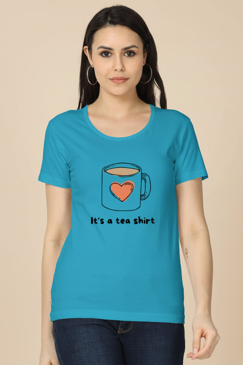 Woman wearing a blue t-shirt with a tea cup design and text.