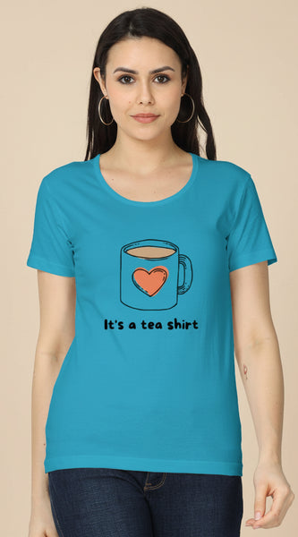 Woman wearing a blue t-shirt with a tea cup design and text.
