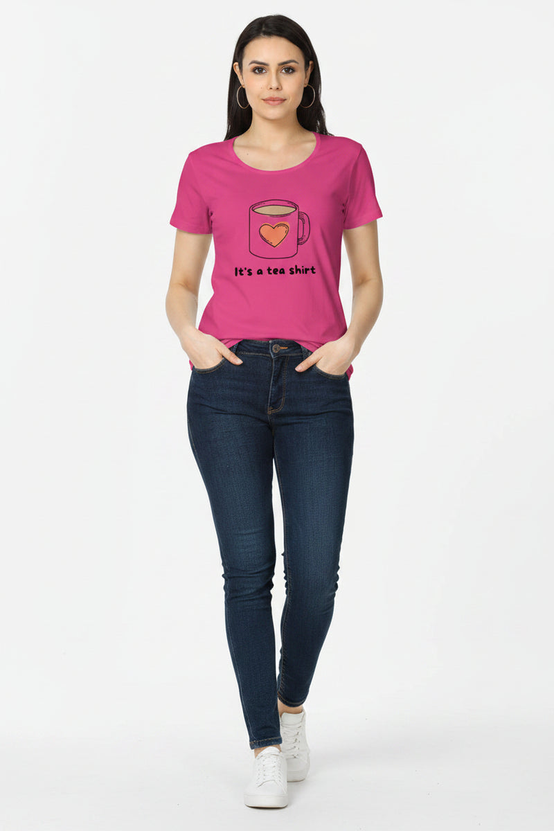 Woman wearing a pink t-shirt with a graphic and text on a pink background