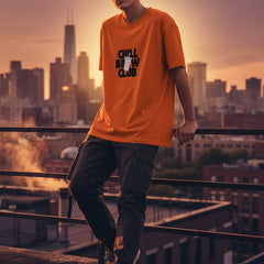 Orange t-shirt with 'Chill Brew Club' text and graphic on a white background