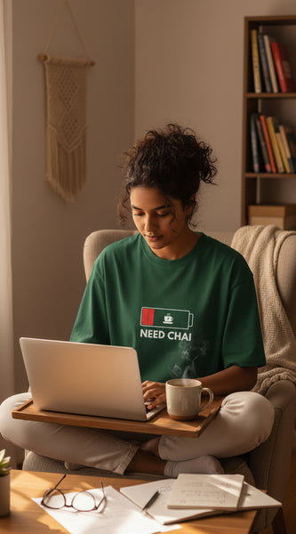 Green t-shirt with 'Need Chai' graphic on a white background