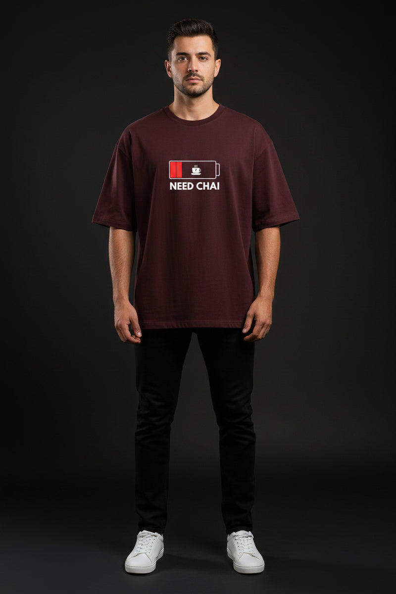 Brown t-shirt with 'NEED CHAI' graphic on a white background