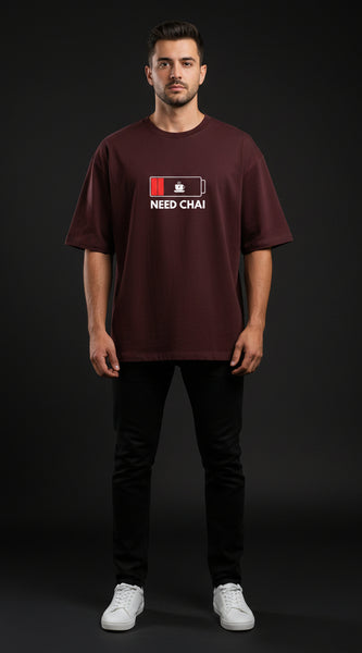 Brown t-shirt with 'NEED CHAI' graphic on a white background