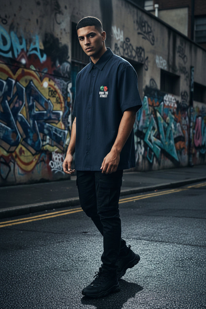 Blue  shirt with graphic design and text on a white background
