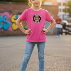 Pink t-shirt with a 'Donut Give Up' graphic on a white background