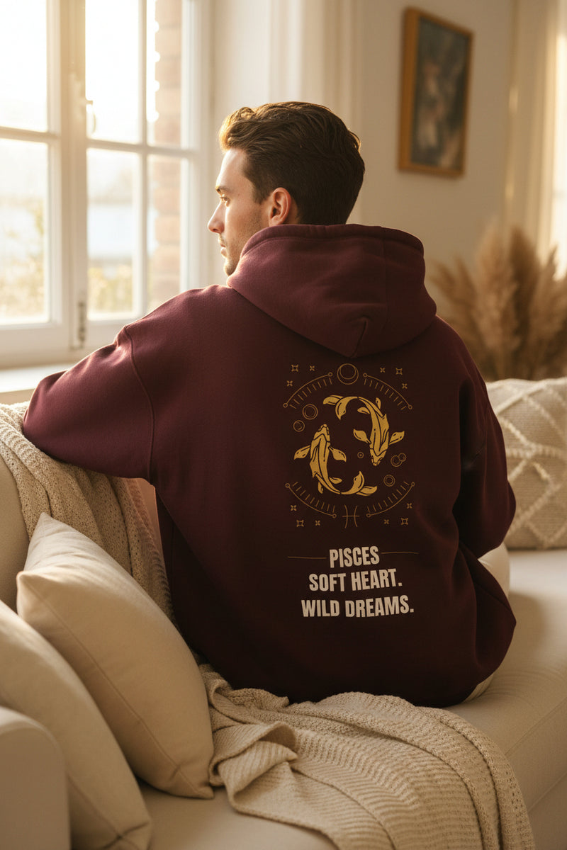 Maroon hoodie with Scorpio zodiac design and text on a white background