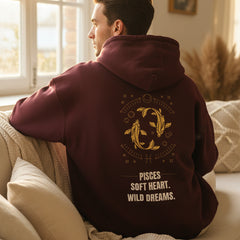 Maroon hoodie with Scorpio zodiac design and text on a white background