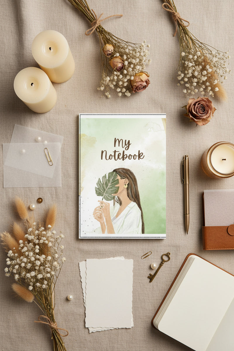 Notebook cover with illustration of a woman holding a leaf and text 'My Notebook' on a light green background.