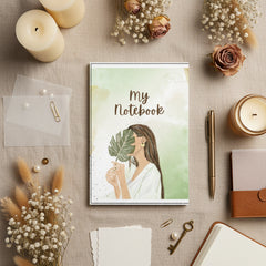 Notebook cover with illustration of a woman holding a leaf and text 'My Notebook' on a light green background.