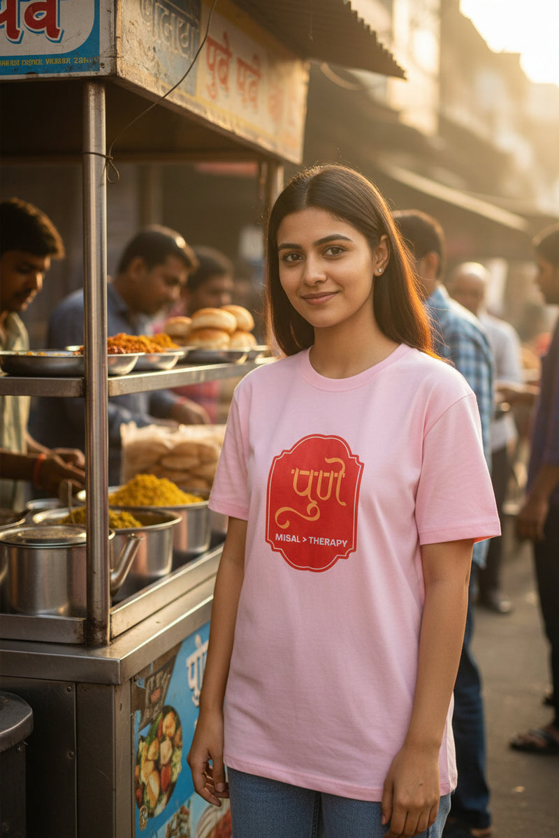 Pink t-shirt with a red logo and text on a white background