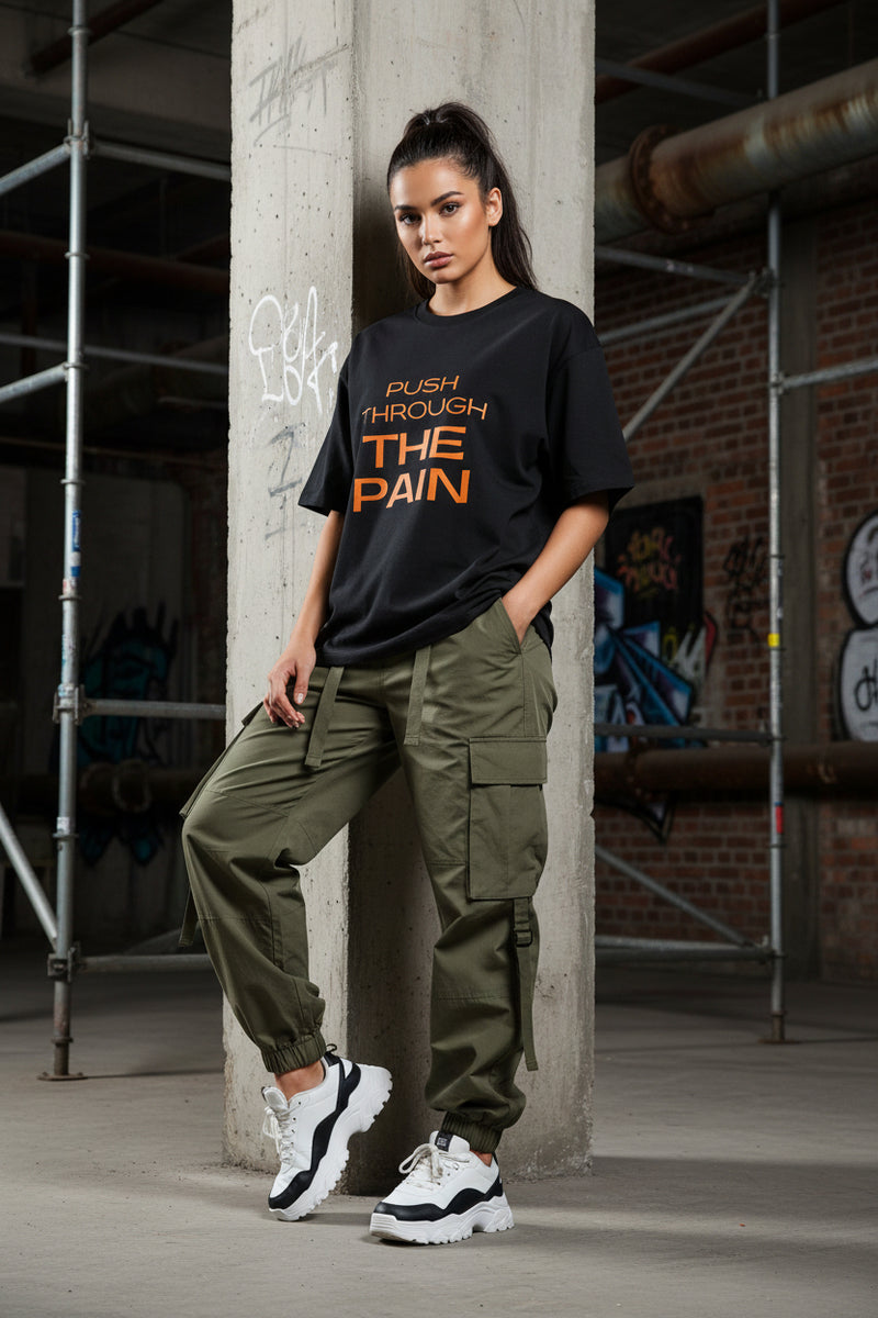 Black t-shirt with 'Push Through The Pain' text in orange on a white background