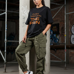 Black t-shirt with 'Push Through The Pain' text in orange on a white background