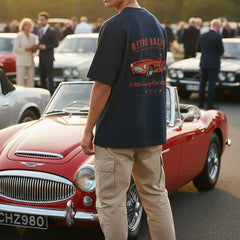 Blue t-shirt with retro racing graphic on a white background