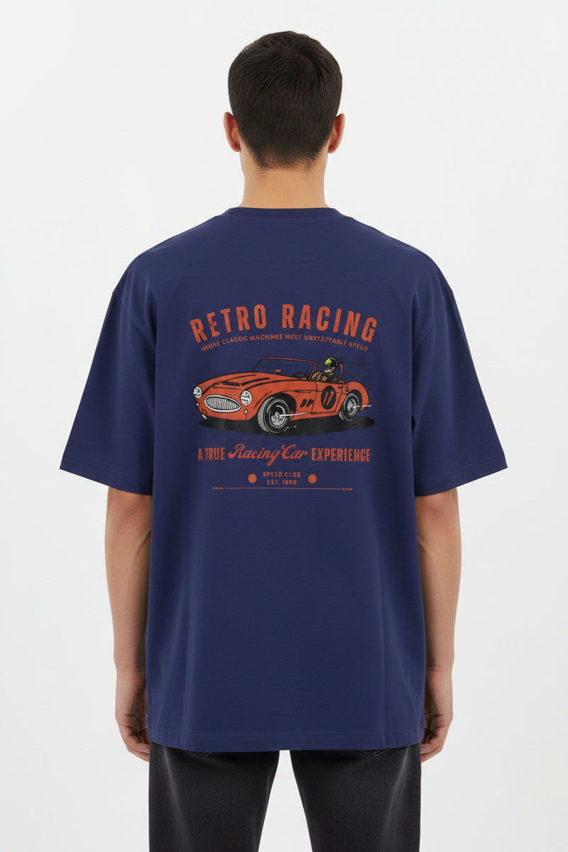 Navy blue t-shirt with orange vintage car graphic and text on a white background