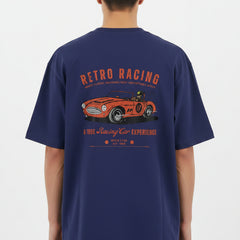 Navy blue t-shirt with orange vintage car graphic and text on a white background
