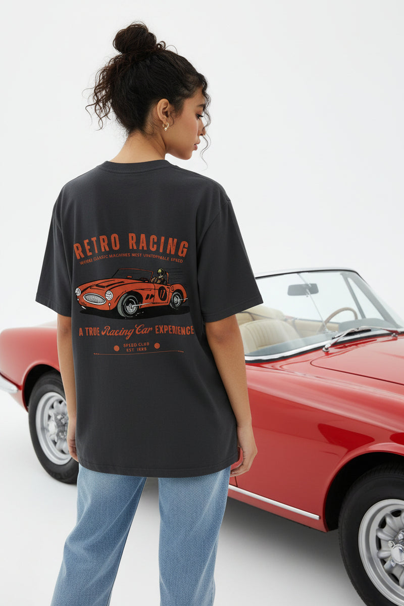Black t-shirt with retro racing car graphic on a white background