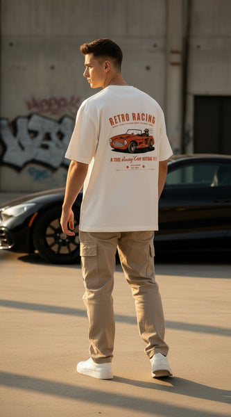 White t-shirt with a retro racing car graphic and text on a white background