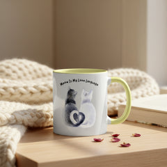 Mug with cat design and text 'Meow is my love language' on a pink background