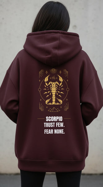Maroon hoodie with Scorpio zodiac design and text on a white background