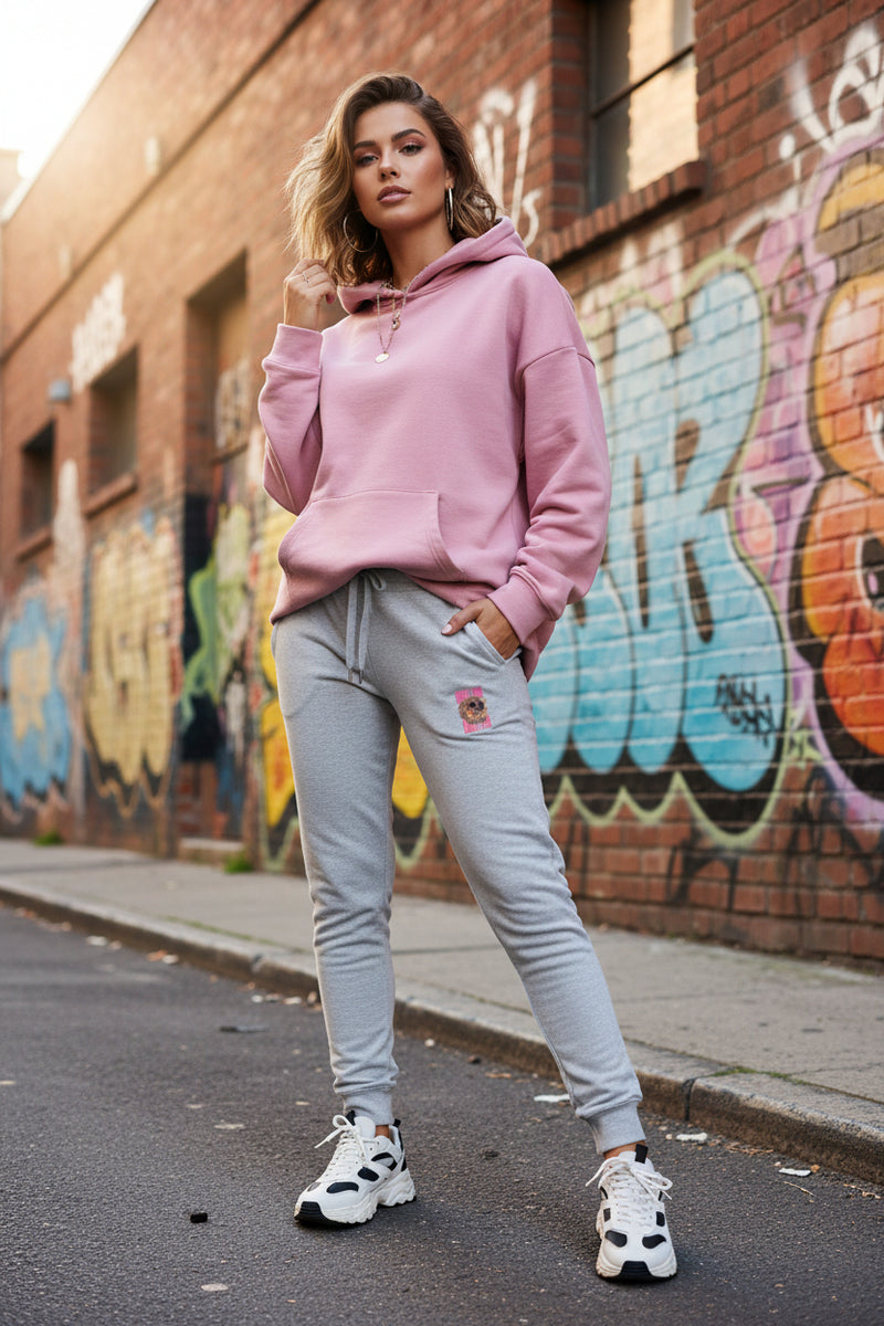 Gray sweatpants with a small patch on a white background
