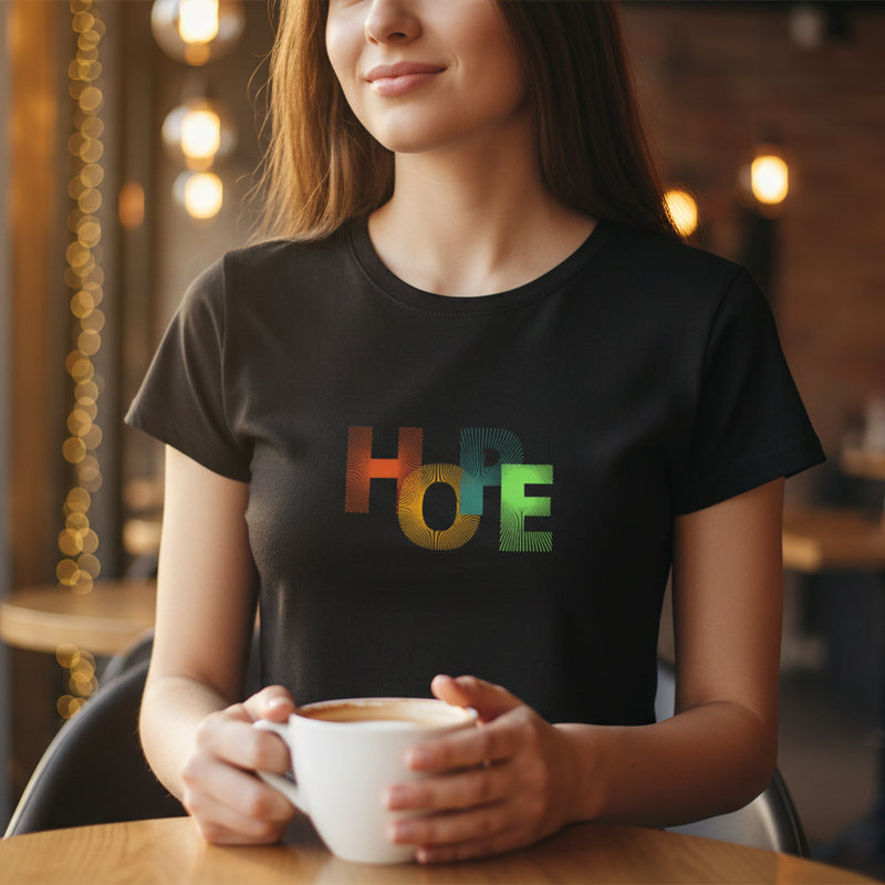 Black t-shirt with colorful 'HODLE' text on a white background