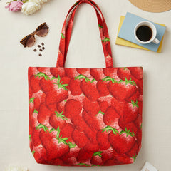 Red fabric with strawberry pattern on a white background
