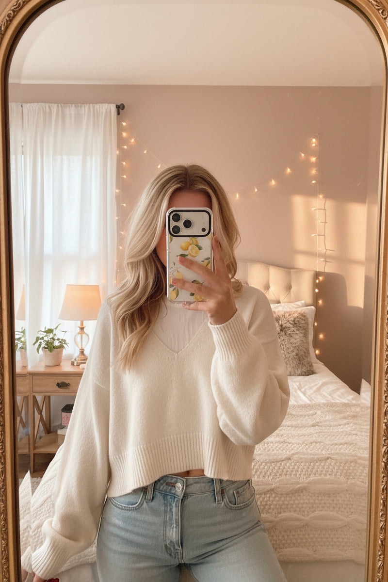 Phone case with lemon design on a light gray background
