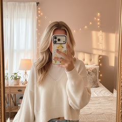 Phone case with lemon design on a light gray background