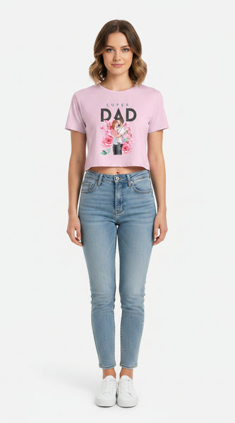 Pink t-shirt with 'Super Dad' graphic on a white background