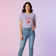 Woman wearing a light purple t-shirt with a graphic design on a white background