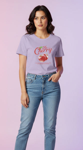 Woman wearing a light purple t-shirt with a graphic design on a white background