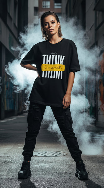 Black t-shirt with white text and yellow box on a white background