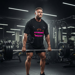 Black t-shirt with colorful text and graphics on a white background