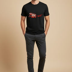 Black t-shirt with a red double-decker bus graphic and text on a white background