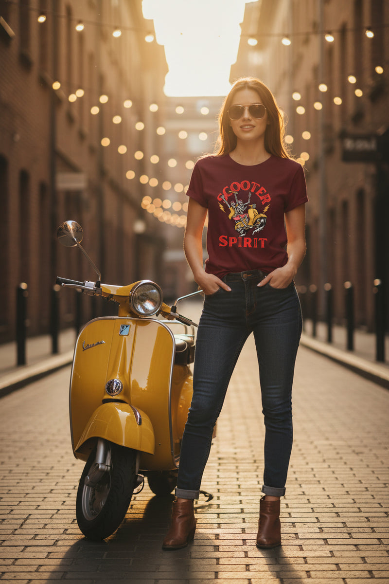 Maroon t-shirt with a graphic design of a skeleton on a scooter and text 'Scooter Spirit' on a white background.
