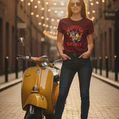 Maroon t-shirt with a graphic design of a skeleton on a scooter and text 'Scooter Spirit' on a white background.