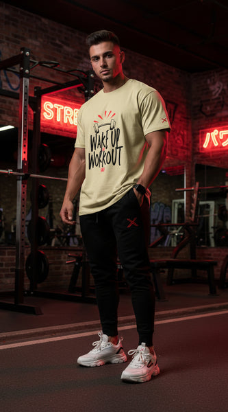 Beige t-shirt with 'Wake Up Workout' text and graphic on a white background