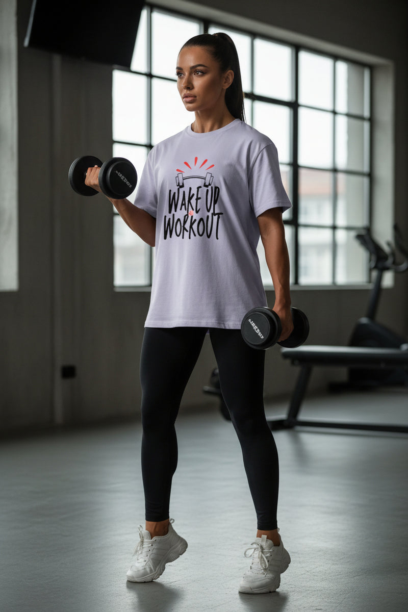 Lavender t-shirt with 'Wake Up Workout' text and graphic on a white background