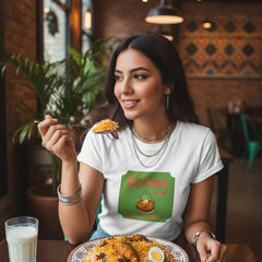 White t-shirt with a green label featuring text and an image of food on a white background