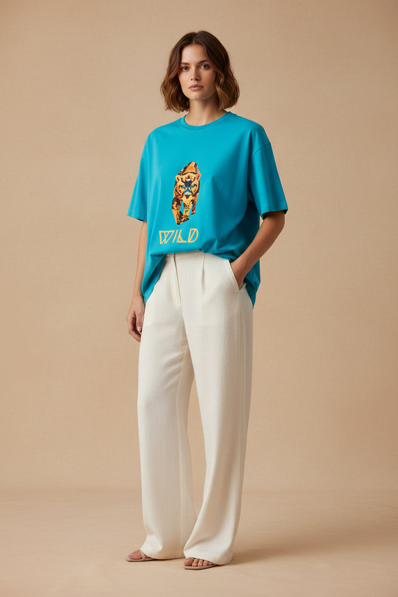 Blue t-shirt with a tiger graphic and 'WILD' text on a white background