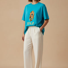 Blue t-shirt with a tiger graphic and 'WILD' text on a white background