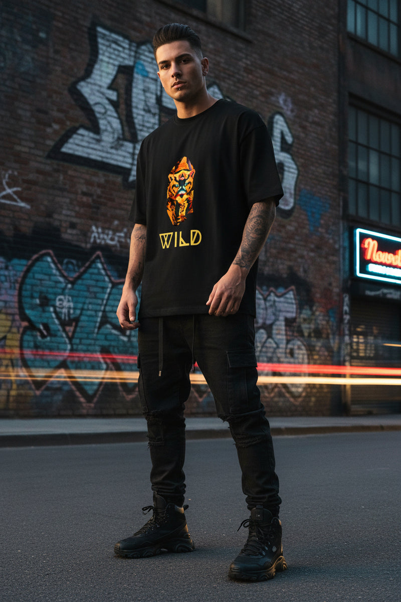 Black t-shirt with a colorful panther graphic and 'WILD' text on a white background